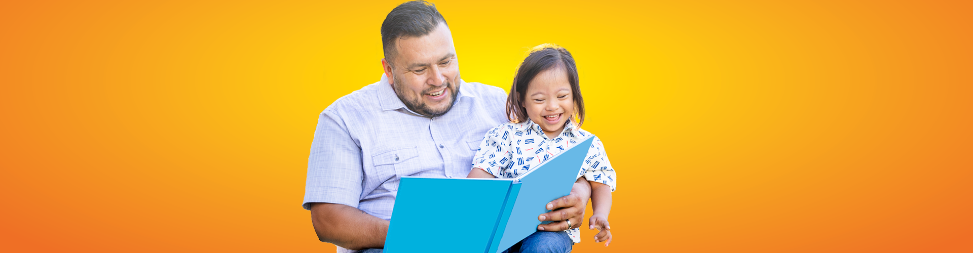 dad reading to kid lap
